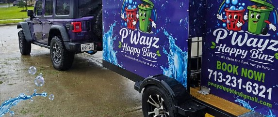 The P'Wayz Happy Binz Jeep and wrapped bin cleaning trailer parked on a neighborhood street